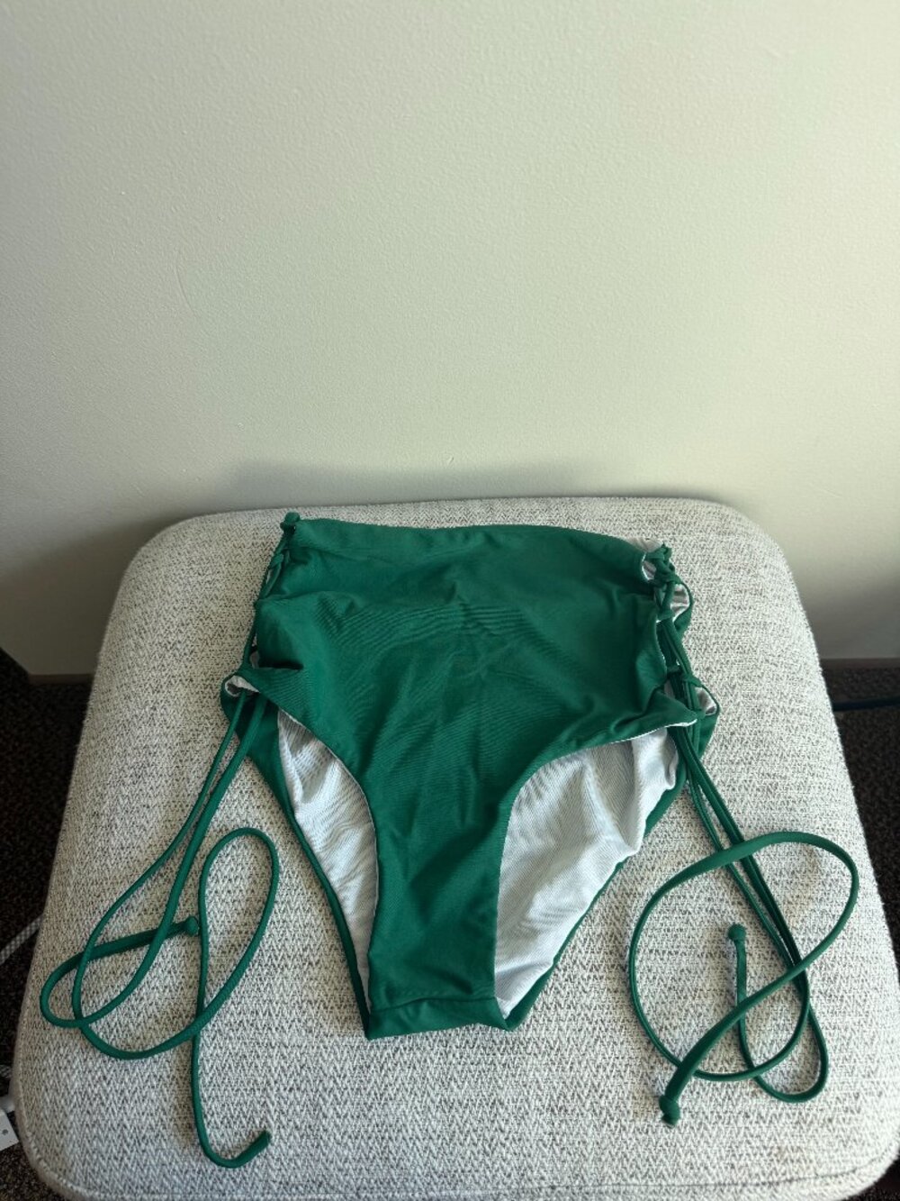 Green high waist bikini bottom with side lace-up ties.